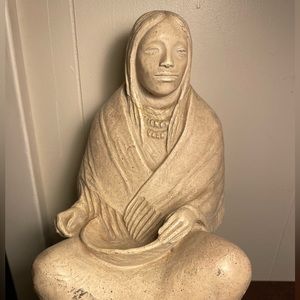Native American woman holding a bowl statue. Austin Productions. 1983.